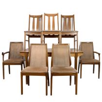 Mid century Nathan beech wood extending dining table and four chairs with three additional chairs...