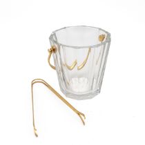 Baccarat facetted glass ice bucket with gilt coloured swing handle and ice tongs, the base engrav...