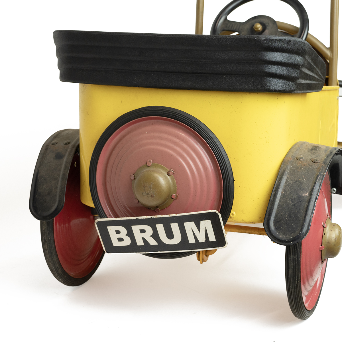 A vintage "Ragdoll Brum 2003" ride-on pedal car in yellow and red with pedals and crank handle, t... - Image 3 of 5