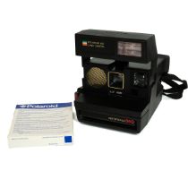 Various vintage cameras and accessories to include Kodak Brownie, Praktica FX, Polaroid, Olympus ...