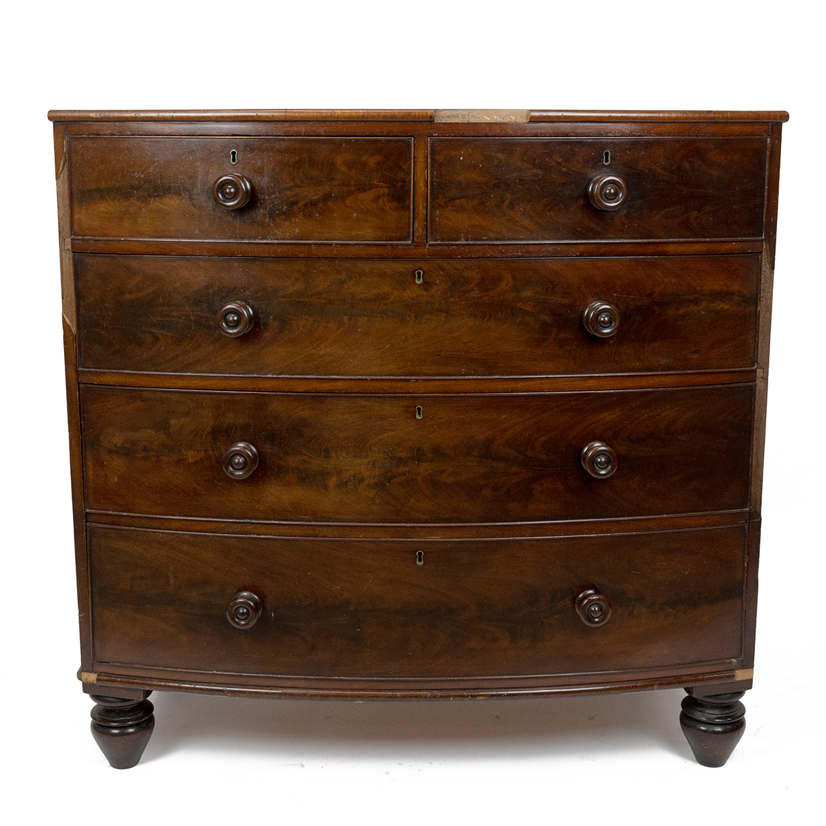 Mid Victorian Mahogany bow fronted chest of drawers. Two small over three long graduated drawers ...