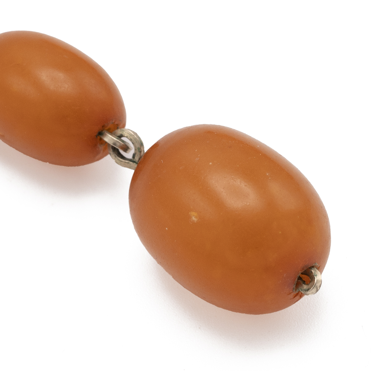 Pair of butterscotch amber double bead earrings with yellow metal shepherds hook fittings. 6.6g - Image 2 of 2