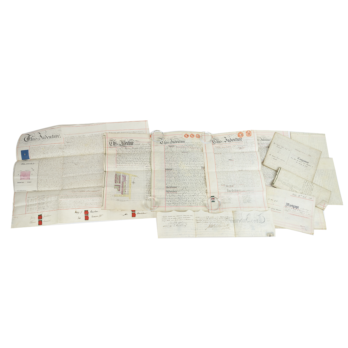 Indentures and conveyances dating from the 1840's to 1890's relating to various land and properti...