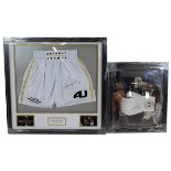 Anthony Joshua - heavyweight boxing champion - A signed white boxing glove with a certificate of ...