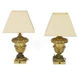 A pair of 20th-century gilt metal lamps, decorated with leaf decoration, of bulbous form and stan...