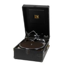 HMV 102d picnic gramophone.  Black Rexine case with teak soundboard. Closed: W 29cm, D 42cm, H 17cm.