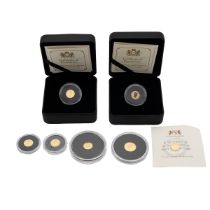A collection of seven 24ct gold-proof commemorative collectors coins to include the 2021 50th ann...