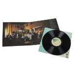 Eagles - An original Eagles Hotel California LP vinyl album, with poster and the cover signed by ...