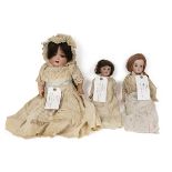 German Armand Marsaille dolls c1900 (3). Tallest 19 inch bisque  with opening eyes in period clot...