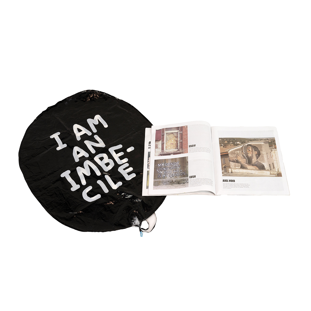 Banksy (B. 1974), "I am an imbecile" balloon, 90 x 60 cm, along with a Dismaland souvenir programme. - Image 2 of 2