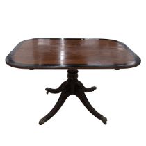 Regency mahogany tilt top breakfast table c1820s. Rectangular top with wide ebony band, single ba...