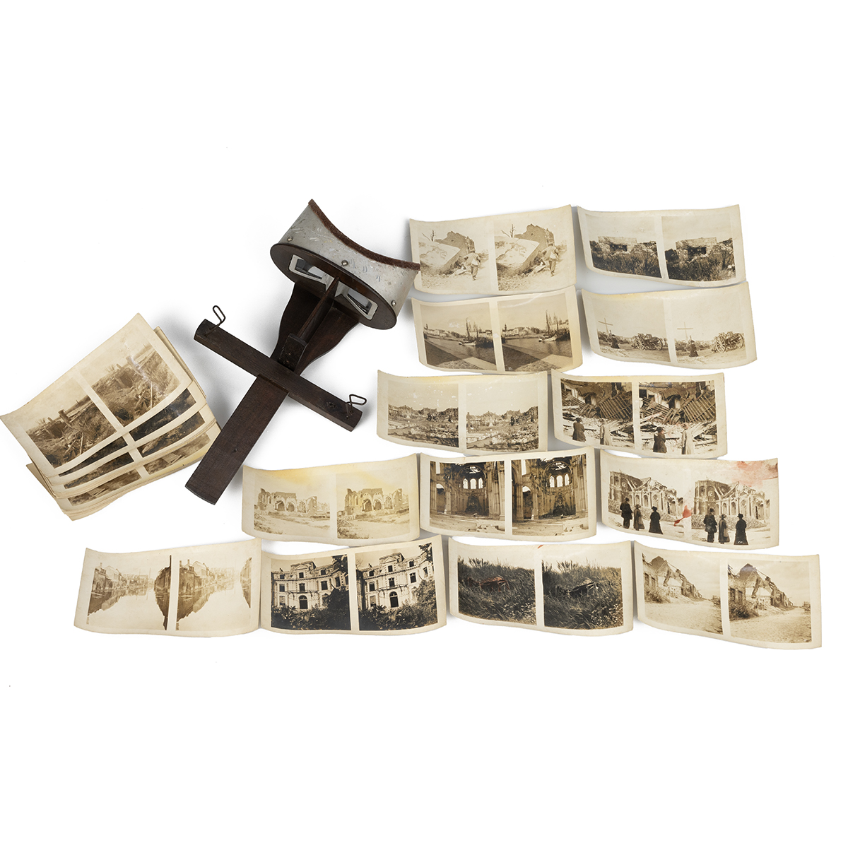 Stereoscope hand viewer with metal eye surround. Together with a collection of 'The Battle-Field ...