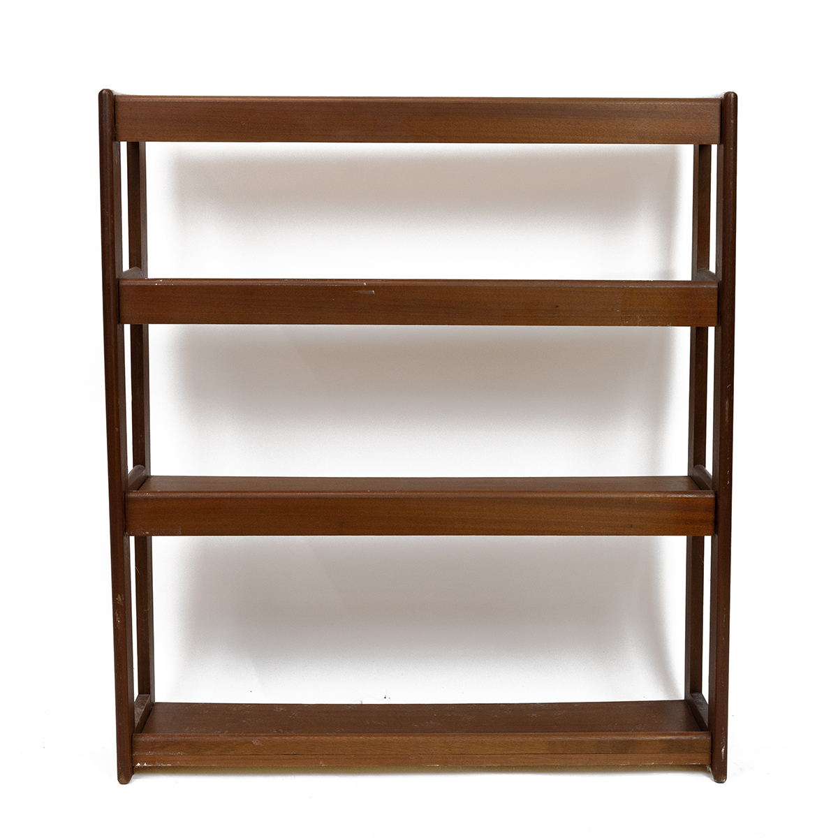 Mid Century teak three tier open bookcase. H 94cm, W 83cm, D 29cm.