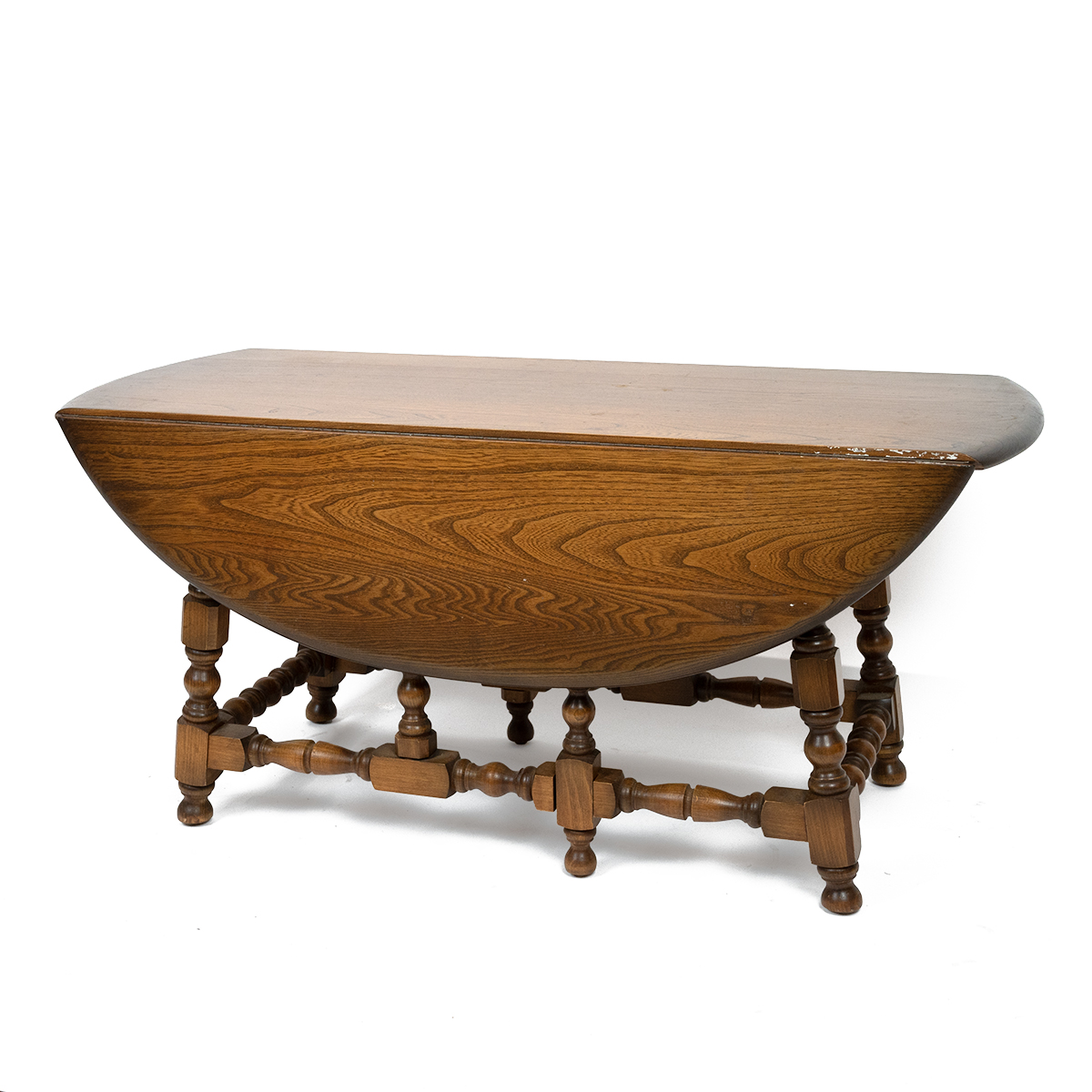 Mid Century Ercol elm coffee table with Golden Dawn finish. Oval drop leaf top with turned column... - Image 2 of 3