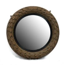 19th Century circular wall mirror with moulded plaster and gilt laurel wreath frame. Convex mirro...