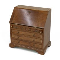 20th Century mahogany Apprentice Piece bureau of 2 short drawers over three long with hinged writ...