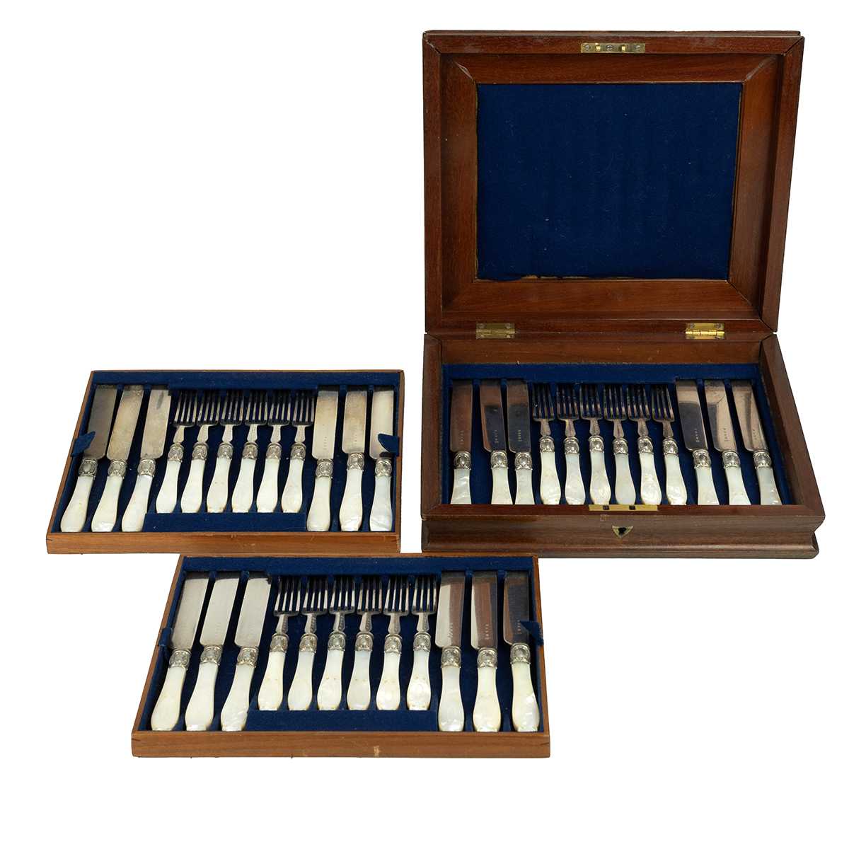 A boxed canteen of cutlery containing three trays each containing six knives and six forks with m...