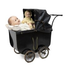 Early 20th Century dolls pram in black with rexine visor, H 75cm, W 44cm, L 85cm. Together with t...