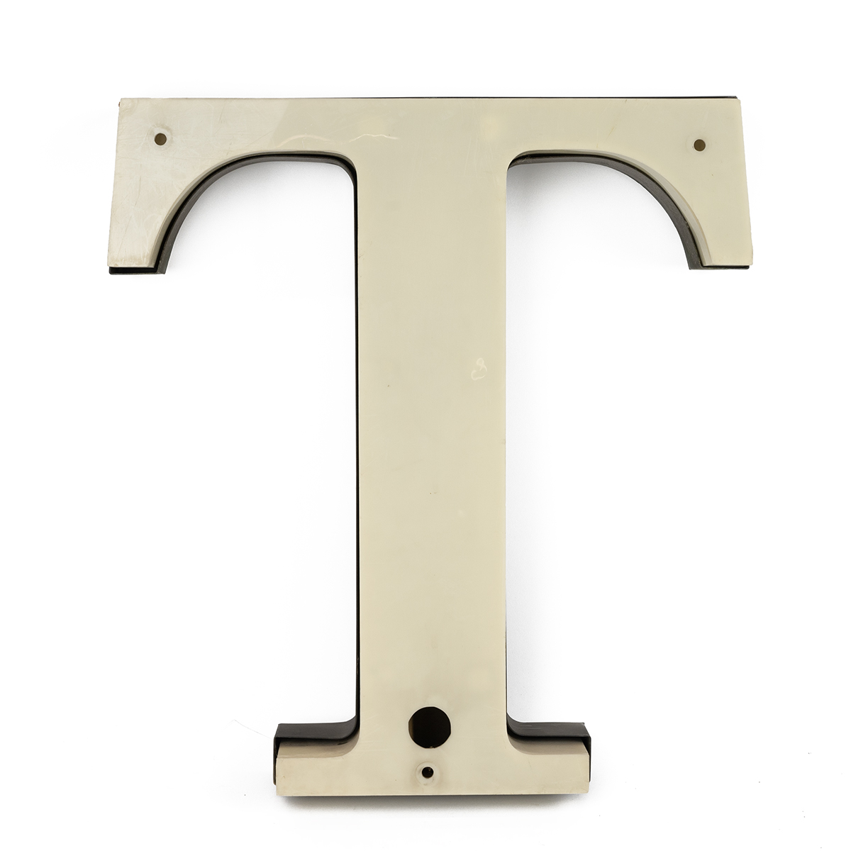 Vintage advertising letter "T" in plastic with metal backing and neon tube lighting. Height 50cm,...