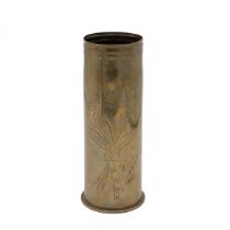 World War I trench art brass shell case vase with pricked decoration of four leafed clovers, oak ...