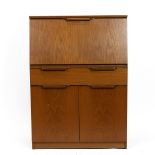 Mid century beech wood bureau with pull down writing slope opening to reveal an interior fitted w...