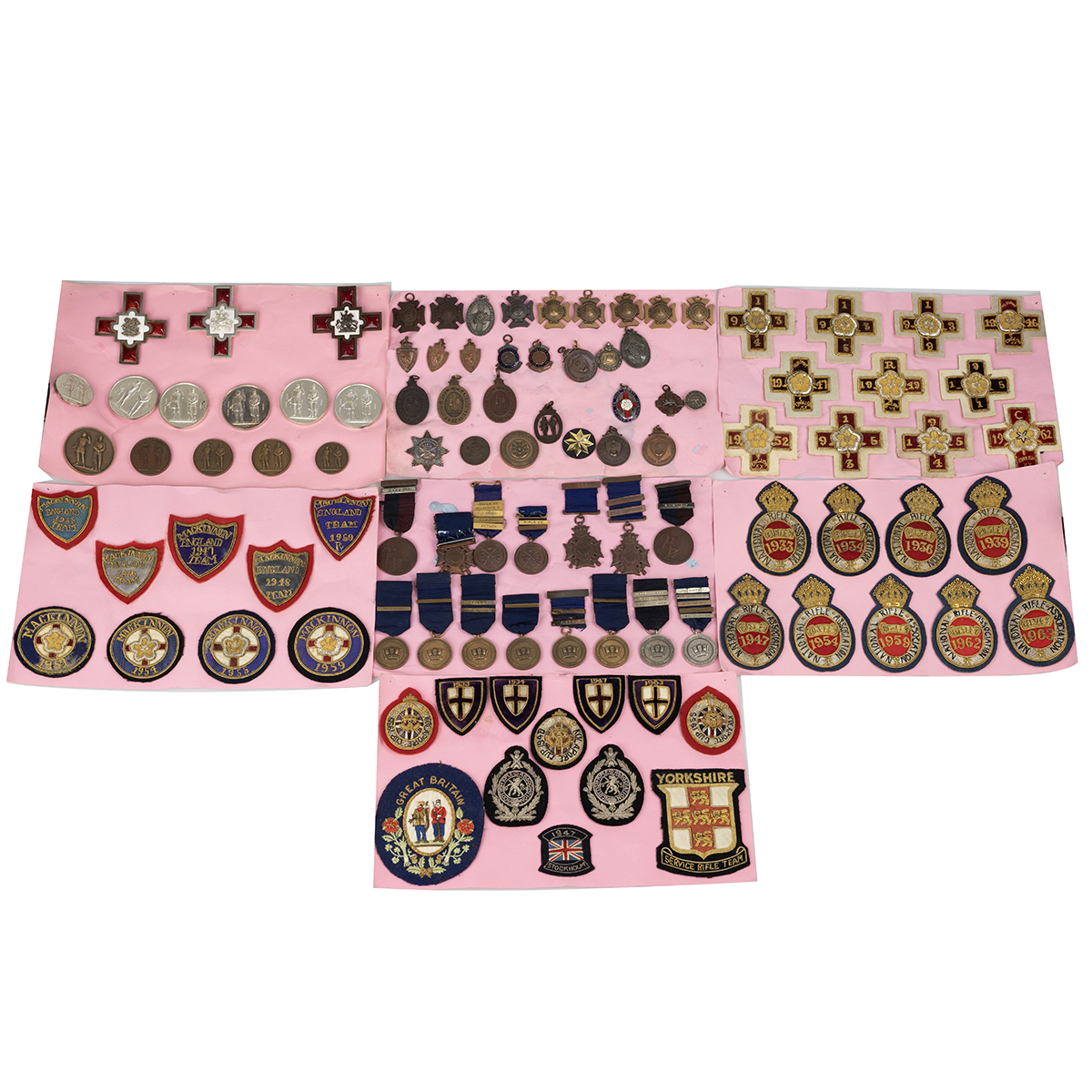 Collection of Rifle Association badges, cloth patches and medals c1850s- 1960s . Badges and medal...