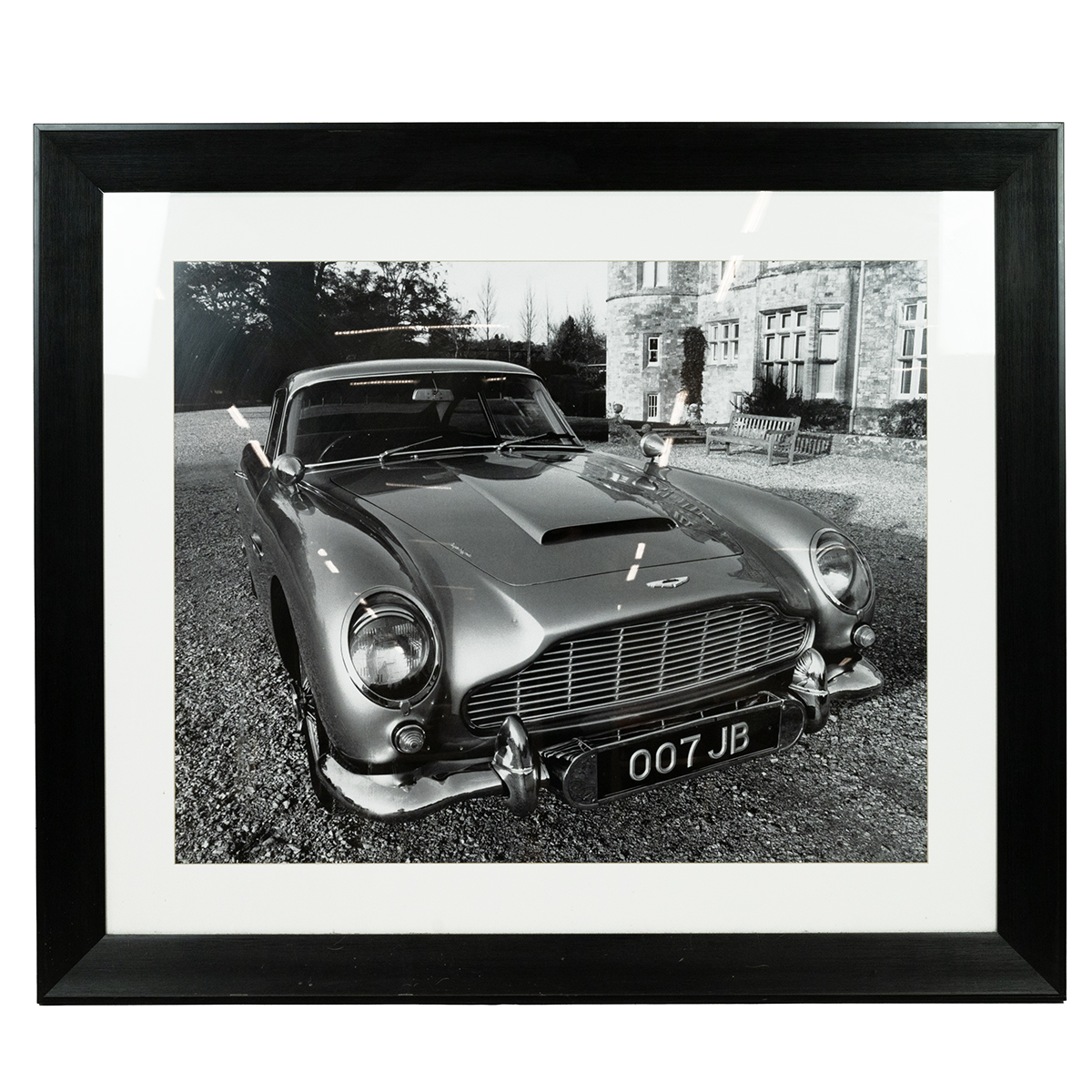 James Bond Interest. Large Framed black and white photographic print of an Aston Martin DB7 with ...