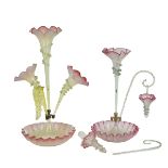 Victorian pink vaseline glass epergne with tall central trumpet shaped flute flanked by two short...
