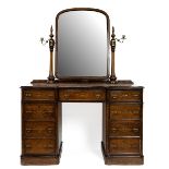 Mid 19th Century Gothic Revival dressing table in burr walnut of kneehole pedestal form, with swi...