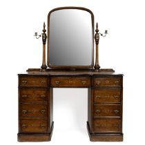 Mid 19th Century Gothic Revival dressing table in burr walnut of kneehole pedestal form, with swi...