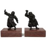 Two late 19th/early 20th century Japanese Meiji era bronzes of Chinese boys, one holding a stone ...