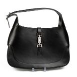 Modern Gucci black leather handbag with a single loop handle, silver coloured hardware and single...