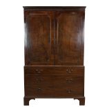 Georgian flame mahogany linen press, three drawers, with swan neck brass handles below cabinet wi...