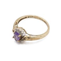 9ct gold ring, set with central amethyst, surrounded by 10 moissanite set stones. Size N1/2.