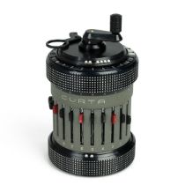 Curta II calculator serial 535150 manufactured March 1966. Black and grey body with black plastic...