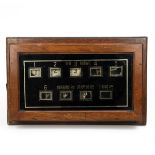 Antique servant's wall mounted bell box c1900. Teak frame with glass front, wring tags and window...