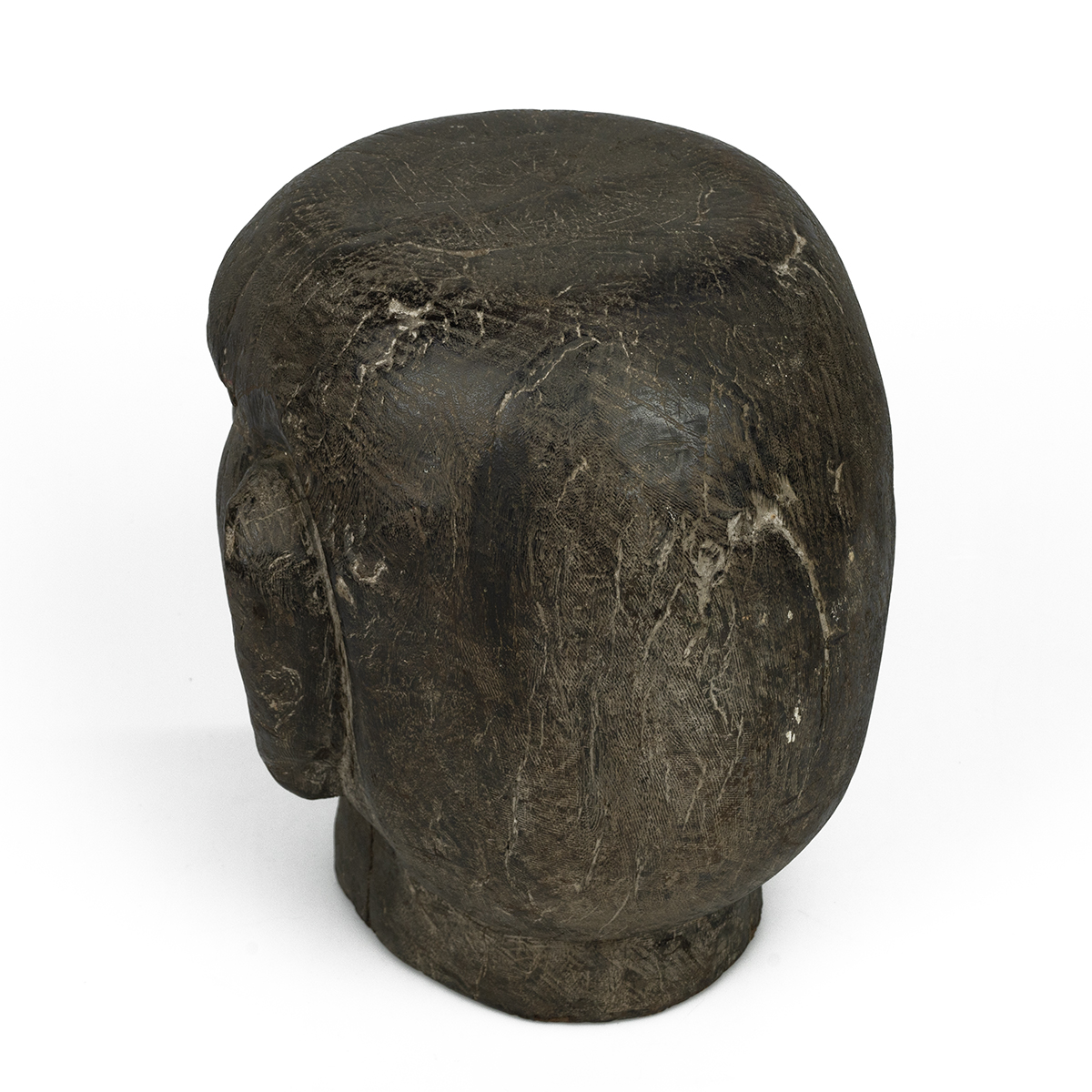 A 20th-century solid carved wooden tribal ancestor head, 25cm high, 23cm wide. - Image 3 of 3