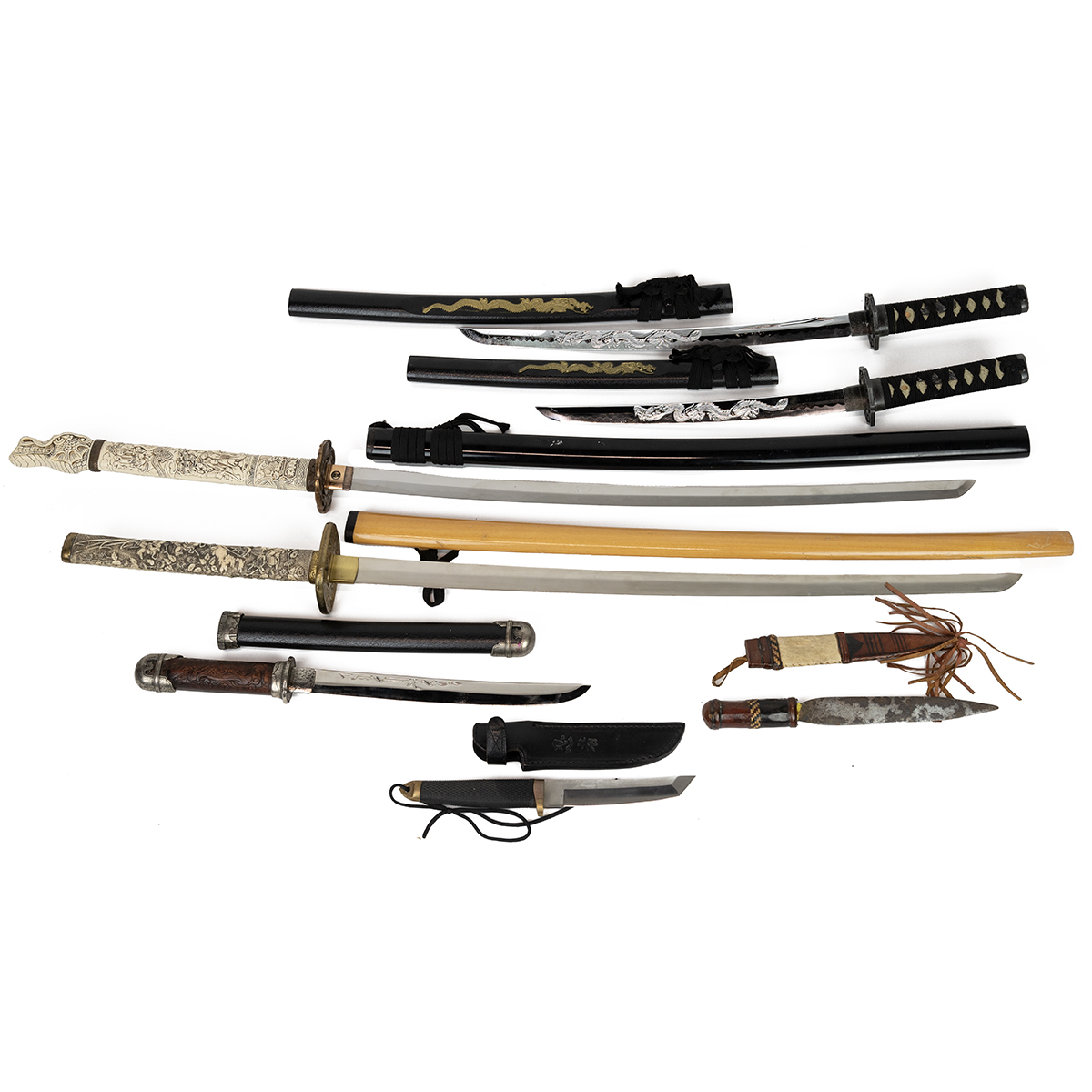 Collection of four reproduction collector samurai swords, the grip decorated with various figures... - Image 2 of 4