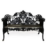 Late 19th Century cast iron Coalbrookdale style 'Oak & Ivy' pattern garden bench. Back support de...