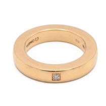 An 18ct gold Omega band, the plain band with serial number "103240, 52", set with a single brilli...