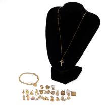 9ct gold charm bracelet, along with various other 9ct gold and gold plated charms, total weight 2...