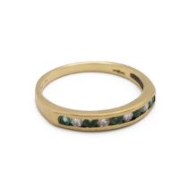 A diamond and emerald 18ct gold half hoop ring, the alternating stones channel set, finger size R...