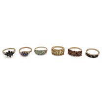 Six modern 9ct gold gem set rings, various designs and makers, 16.61g.