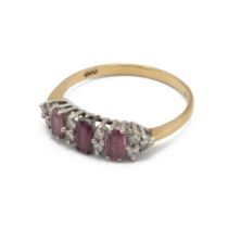 Ruby and diamond 18ct gold ring, the three oval cuts with pairs of small brilliant cuts between a...