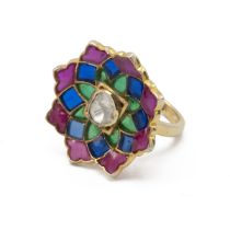 Lasque cut diamond and cold enamel cluster ring, of flower head design, the gilded mount stamped ...