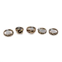 Mid-century Scandinavian bronze rings, includes two rope twice examples, two-knot rings and one o...