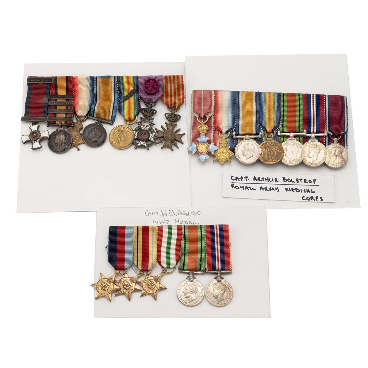 Miniature medal bars x 3, unmarked as issued but two attributed. Unknown 7 medal bar Includes DSO,