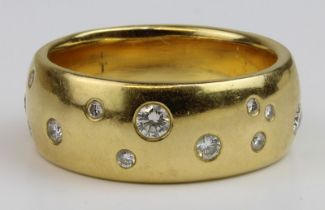 Gelbgold-Bandring mit Brillanten, gestempelt 750 und 0,70 ct., besetzt mit 21 Diamanten im