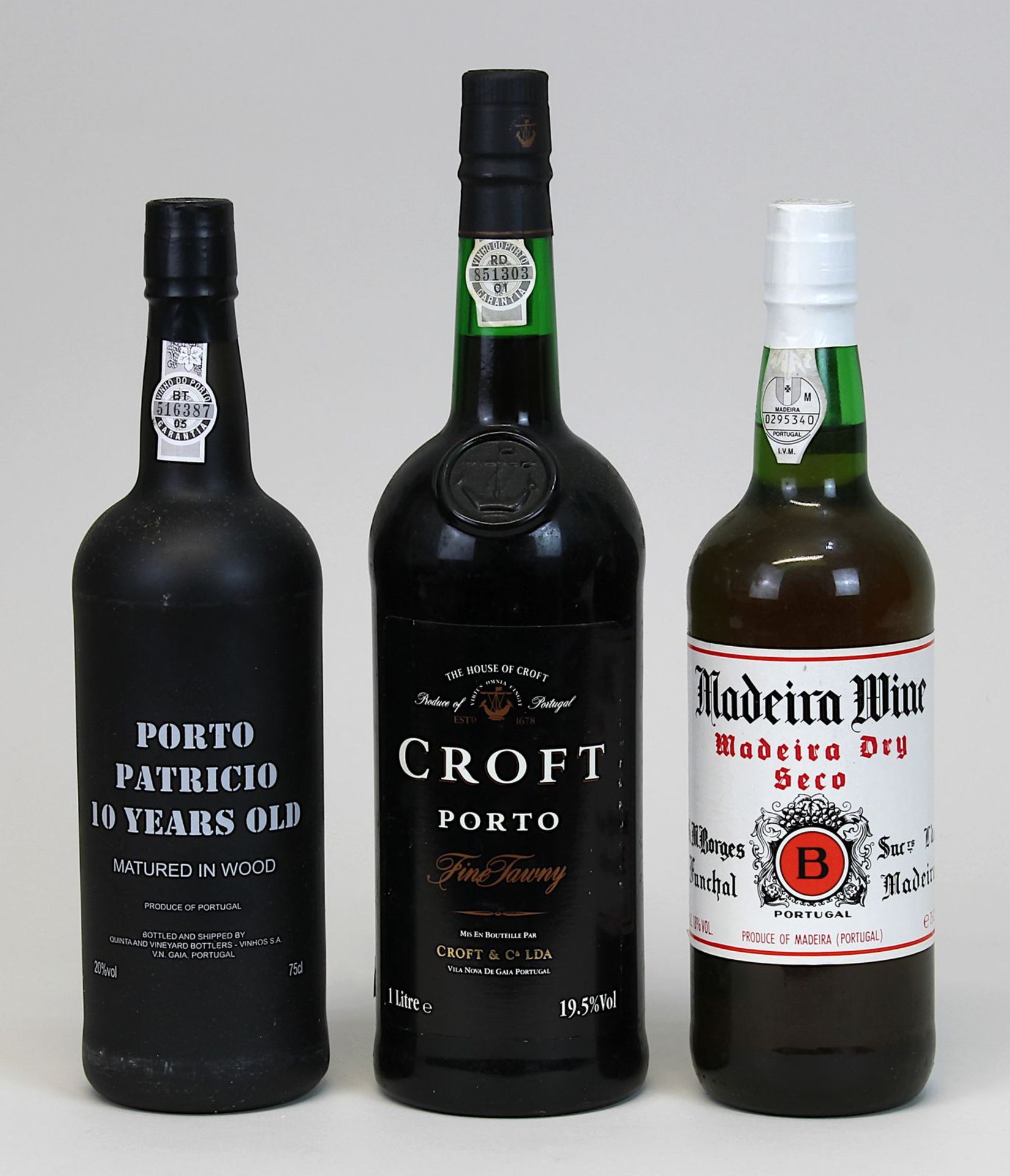 3 Flaschen Portwein und Madeira, 2. H. 20. Jh.: Porto Patricio, 10 Years Old, Gaia Portugal; Croft
