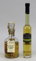 2 Flaschen Spirituosen, 2. H. 20. Jh.: eine Flasche Williams Birnen-Brand, Kammer Karlsruhe, 0,7 L.,